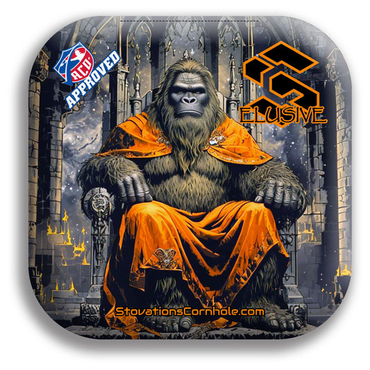 Elusive cornhole bag with Bigfoot sitting on a thrown wearing Orange robes. Stovations Cornhole and ACO logos in top corners. 